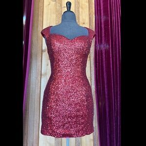 Red sequined cocktail mini dress with back cutout